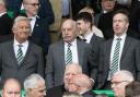 Celtic chairman Peter Lawwell, left, shareholder Dermot Desmond, centre, and chief executive Michael Nicholson, right, at Parkhead this season