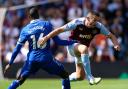 Aston Villa captain John McGinn, right, in action against Everton on Sunday