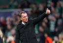 Celtic manager Brendan Rodgers had to console Reo Hatate as he left the pitch against Atletico  Madrid.