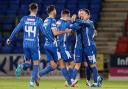 St Johnstone's players celebrate Nicky Clark's opener against Kilmarnock at McDiarmid Park this evening