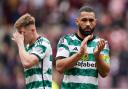 Celtic captain Cameron Carter-Vickers applauds the Parkhead club's fans at Tynecastle on Sunday
