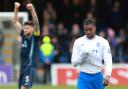 Rangers player Dujon Sterling hangs his head as the full-time whistle blows at the Global Energy Stadium on Sunday as a Ross County player celebrates