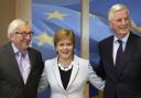 First Minister Nicola Sturgeon poses with European Commission President Jean-Claude Juncker, left, and European Union chief Brexit negotiator Michel Barnier prior to a meeting at EU headquarters in Brussels, June 11, 2019. (AP Photo)