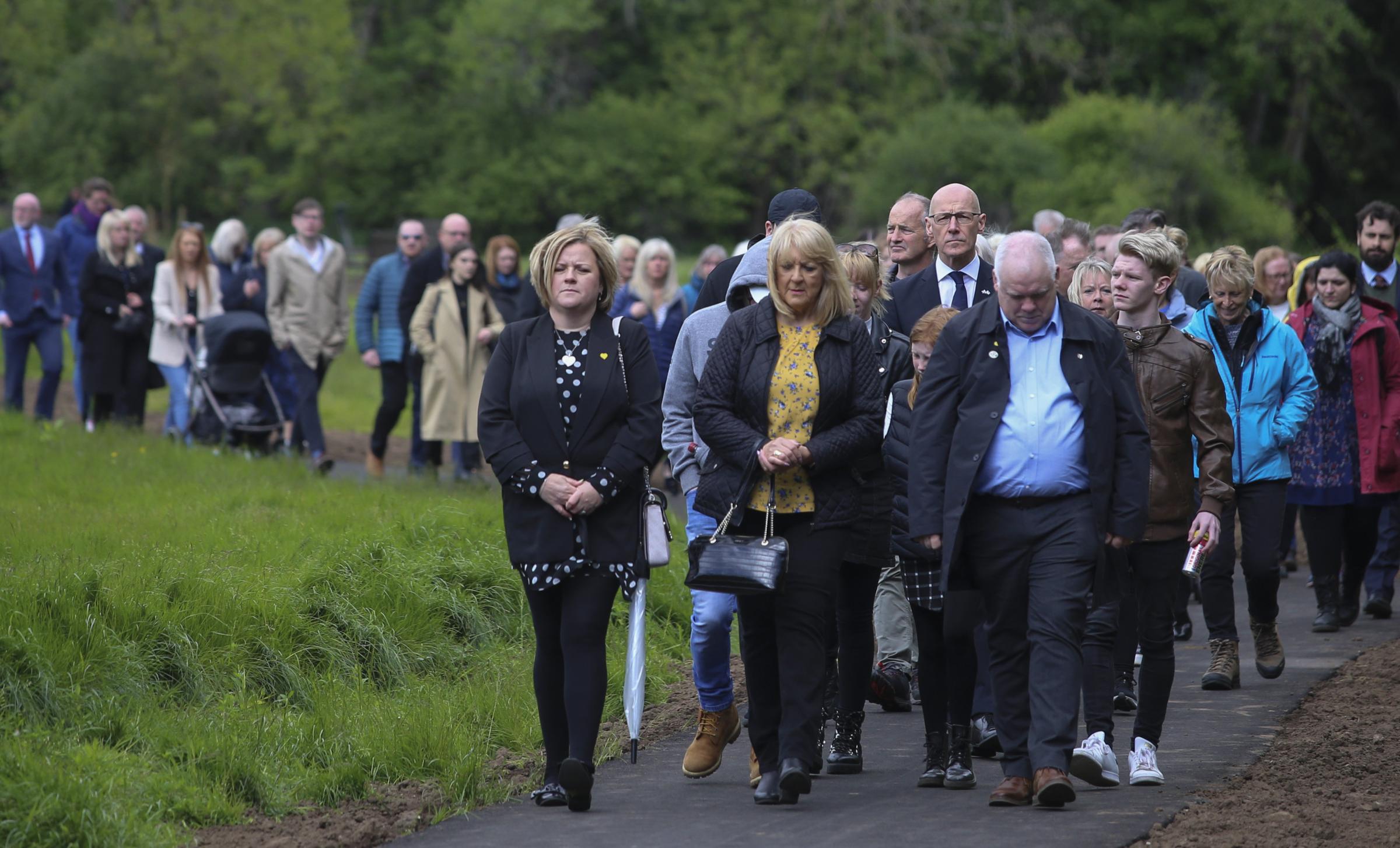Families affected by Covid at the opening of the Covid Memorial Garden in Pollok Park. Deputy First Minister John Swinney also laid a wreath and joined families on a walk through the garden. Photo Gordon Terris Herald & Times.
