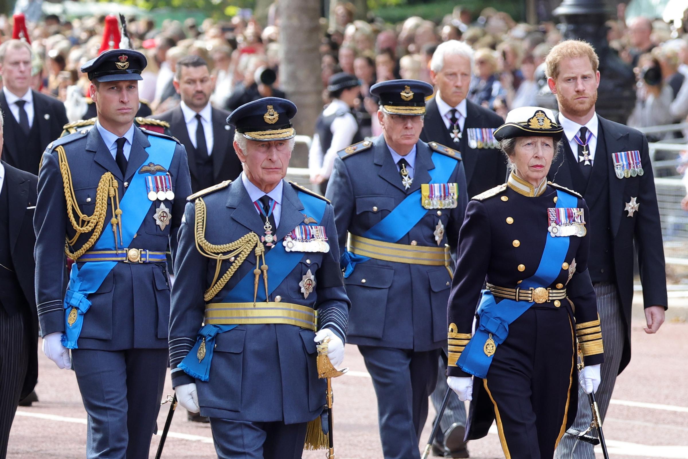LONDON, ENGLAND - SEPTEMBER 14: Prince William, Prince of Wales, King Charles III, Prince Richard, Duke of Gloucester, Anne, Princess Royal and Prince Harry, Duke of Sussex walk behind the coffin during the procession for the Lying-in State of Queen