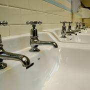 Mears Facilities Management dismissed manager Bev Parkinson after he raised concerns about legionella in the water systems of Highland Council school.
