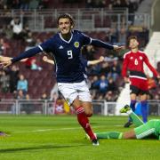 Reims forward Fraser Hornby in action for Scotland's Under-21 side