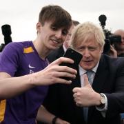 Prime Minister Boris Johnson has a selfie taken in Hartlepool, following MP Jill Mortimer's victory in the Hartlepool parliamentary by-election