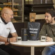 Lawrence Morison of The Good Coffee Company seals the deal on the new partnerships with Social Bite founder Josh Littlejohn. Picture: Jeff Holmes