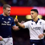 Referee Nic Berry shows a yellow card to Scotland's Finn Russell (not pictured) during the Guinness Six Nations match at the Principality Stadium, Cardiff. Picture: PA
