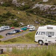 Tourist facilties were put under pressure due to the high number of holidaymakers. Pictured is the A838 near Ullapool as tourists took to the North Coast 500 route in July 2020. Photo Getty.