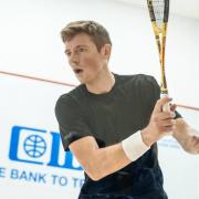 Greg Lobban setting out for two golds at the World Doubles Squash Championships