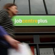 Scotland's jobs picture improves but wages squeeze worsens