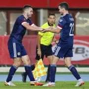 John McGinn says playing with brother Paul in Austria was the highlight of his Scotland career.