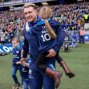 Stuart Hogg marks his 100th cap with his children at Murrayfield. He has shocked the world with his announcement he is retiring at the end of the World Cup