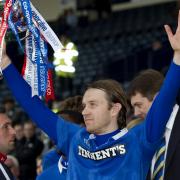 Rangers star Sasa Papac celebrates with the Co-operative Insurance Cup