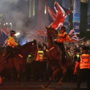 Police struggle to gain control as pro-Union protestors clash with independence supporters in Glasgow’s George Square at the close of the 2014 referendum campaign