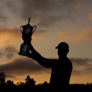 Wyndham Clark of the United States poses with the trophy after securing victory in the final round of the 123rd US Open Championship at The Los Angeles Country Club