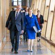 Nicola Sturgeon and John Swinney pictured in March this year before her final First Ministers Questions