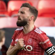 Graeme Shinnie has completed a transfer to Aberdeen