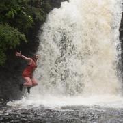 Vicky Allan jumping into the Falls of Rha, from Taking The Plunge, image: Anna Deacon