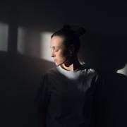 Generic image - A lonely Young Sad Calm Girl Or Woman stands against a white wall, in a psychiatric clinic or at home, in the rays of sunlight, with her eyes closed. The Concept of Depression from Illness and Quarantine, Fatigue and Impotence. Picture: