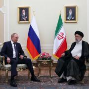 Russian President Vladimir Putin and Iran's President Ebrahim Raisi hold a meeting in Tehran