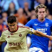 Todd Cantwell of Rangers, right, battles for the ball in the Champions League qualifier against Servette at Ibrox tonight