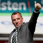 Celtic manager Brendan Rodgers salutes supporters after the cinch Premiership match against Aberdeen at Pittodrie today