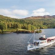 The Sir Walter Scott Steamship sails on Loch Lomond, part of the national park