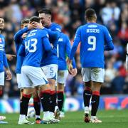 Rangers players celebrate a goal in their 4-0 win over Hibernian t Ibrox on Saturday