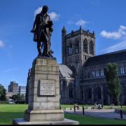 The statue of ornithologist Alexander Wilson next to Paisley Abbey