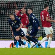 Stuart Armstrong wheels away after scoring Scotland's third against Norway.