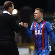 Inverness Caledonian Thistle manager Duncan Ferguson, left, shakes hands with Billy McKay during a game last month