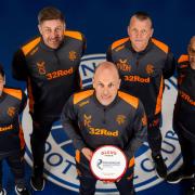 Rangers manager Philippe Clement, front centre, with the Glen's Manager of the Month for January award and his backroom team