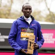 Kelvin Kiptum with the trophy after winning the Men’s elite race during the TCS London Marathon in 2023 (John Walton/PA)