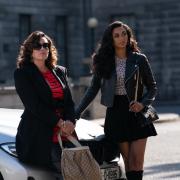 Birdy and Nikita (Maria Doyle Kennedy and Yasmin Seky) collect a family member from prison