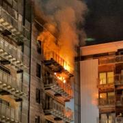 The fire engulfed one of the flats in the block Pic: Graham Simpson