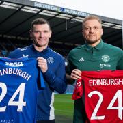 Ex-Rangers captain Lee McCulloch, left, and former Manchester United defender Wes Brown, right, promote the friendly match between the Ibrox and Old Ftrafford clubs in July at Murrayfield in Edinburgh yesterday