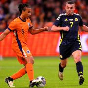 John McGinn, right, in action for Scotland against the Netherlands in Amsterdam on Friday night