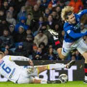 Rangers playmaker Todd Cantwell, right, is fouled in a Premiership game against St Johnstone