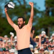 Scottie Scheffler celebrates his win at the Masters golf tournament at Augusta National Golf Club (Ashley Landis/AP)