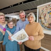 The Dundee Tapestry will return to V&A Dundee later this year. Pictured (L-R): Lily Thomson, Marilyn Gillies, John Fyffe MBE and Sheena Wellington. Lily, Marilyn and Sheena are all featured in the tapestry