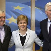 First Minister Nicola Sturgeon poses with European Commission President Jean-Claude Juncker, left, and European Union chief Brexit negotiator Michel Barnier prior to a meeting at EU headquarters in Brussels, June 11, 2019. (AP Photo)