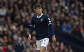 Aaron Hickey in action for Scotland during a UEFA Euro 2024 Qualifier between Scotland and Cyprus at Hampden