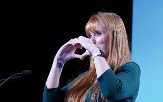 Labour's Angela Rayner makes the heart/love sign to TUC delegates in Liverpool