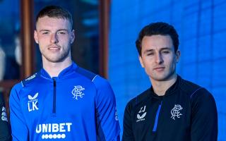Rangers centre half Leon King, left, with the Ibrox club's academy director Zeb Jacobs