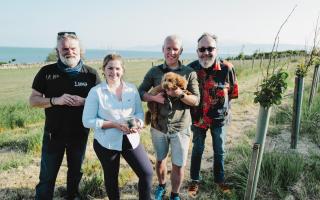 Si King and Dave Myers, outside left and right, visit a truffle-growing couple and their dog on Bute