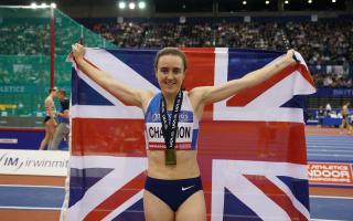Laura Muir celebrates with her medal after winning the 3000m. (Martin Rickett/PA)