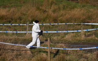 Police at the scene in the Pitilie area on the outskirts of Aberfeldy, Perthshire (Andrew Milligan/PA Wire)